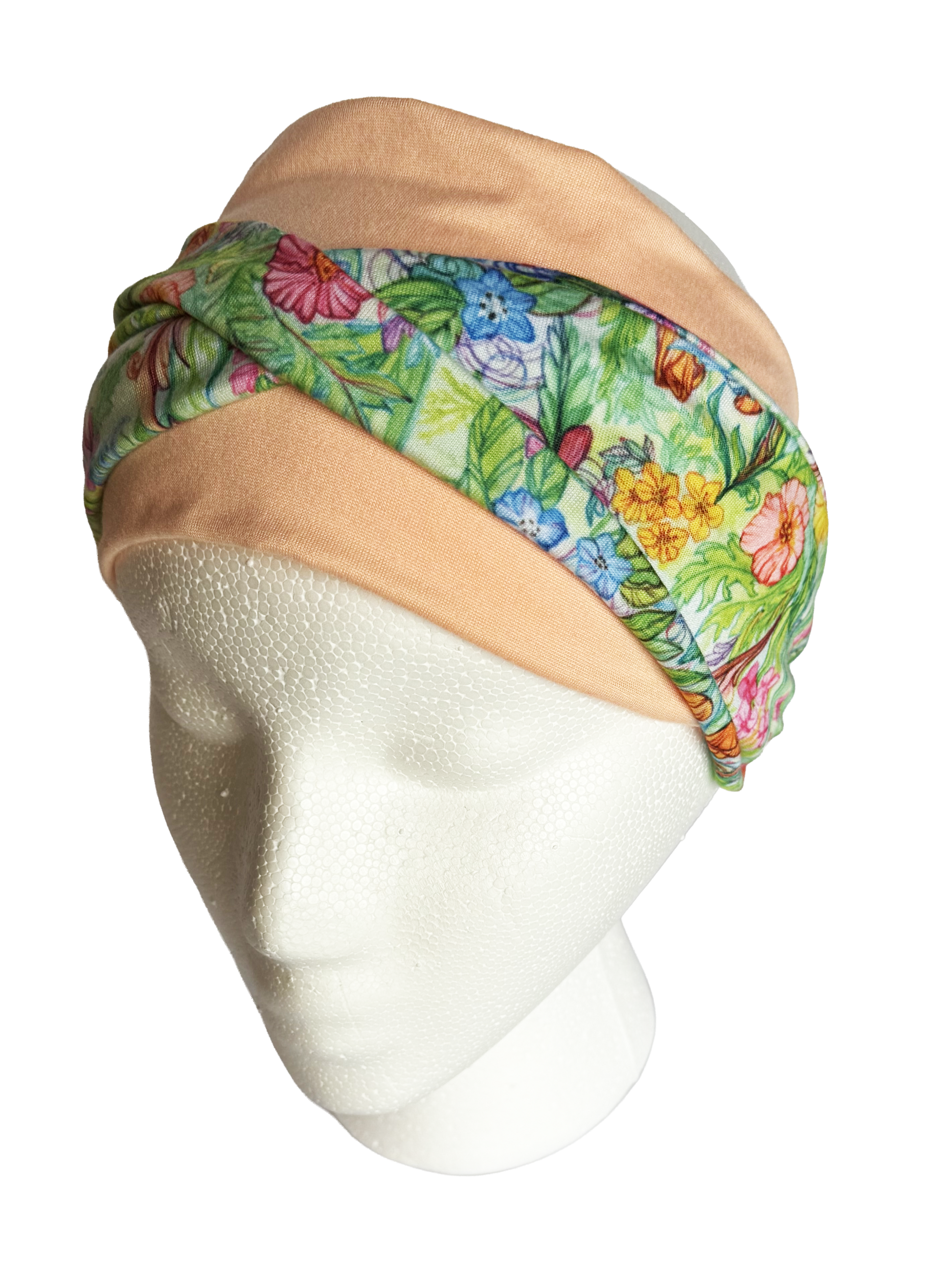 Wildflower twist headband on a coral secondary color